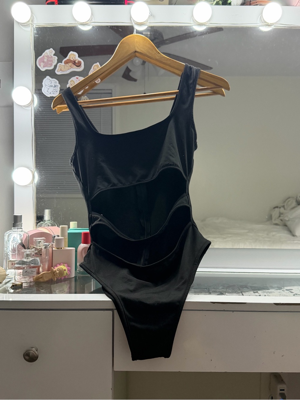 Black slitted bodysuit